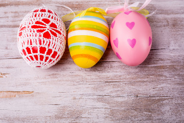 easter eggs on rustic wooden background