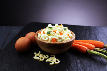 noodle salad with eggs, cucumber and mayonnaise