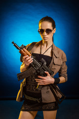 Fototapeta premium Young woman soldiers with guns