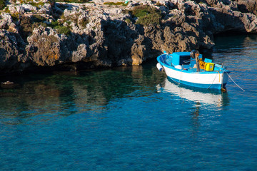 Fototapeta na wymiar Mediterranean fishermen boat near adriatic coast, Salento, Italy