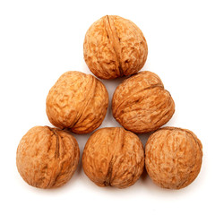 Dry walnuts in shell isolated on white background. Flat lay, top view