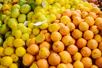Citrus mix from fresh lemon, orange, sweetie, sweety, pomelo on the farm market. Products rich in vitamins. Natural local products on the farm market. Harvest. Seasonal products. Food.