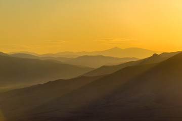 Fototapeta na wymiar Majestic sunset with mountains, Armenia