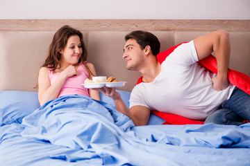 Super hero husband in bed