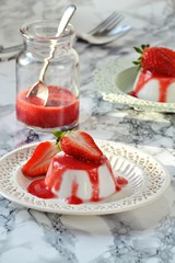 Healthy Vegetarian Coconut Panna Cotta with strawberry sauce 