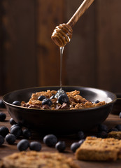 muesli with honey and blueberry © peterzsuzsa