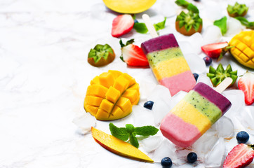 strawberry mango kiwi blueberry ice cream with fruits and ices