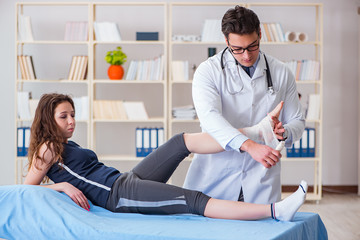 Traumatologist is taking care of the patient