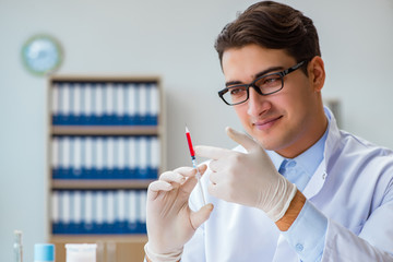 Doctor working with blood samples