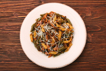 Pasta with meat, sauce and parmesan