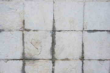 Texture of wall with painted tiles