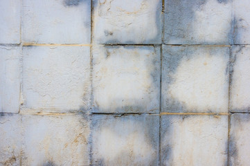 Texture of wall with painted tiles