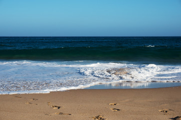 Fototapeta na wymiar Seascape of calm ocean on sunny summer day