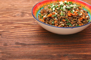 Lentil with carrot and onion in bowl