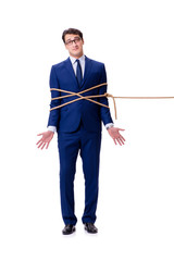 Businessman caught with rope lasso isolated on white