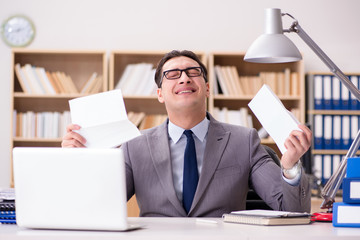 Businessman receiving letter in the office