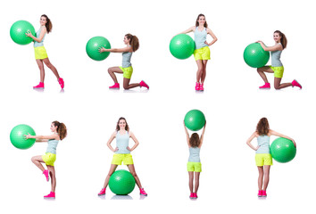 Young woman with ball exercising on white