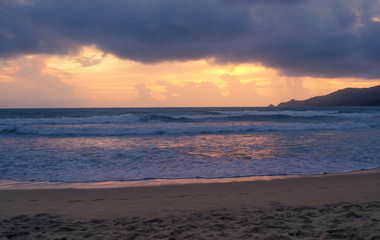 Golden sky at sunset over the andaman sea beach thailand