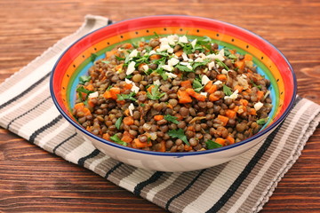 Lentil with carrot and onion in bowl