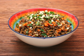 Lentil with carrot and onion in bowl
