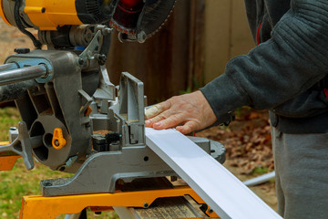 Circular Saw. Carpenter Using Circular Saw for wood