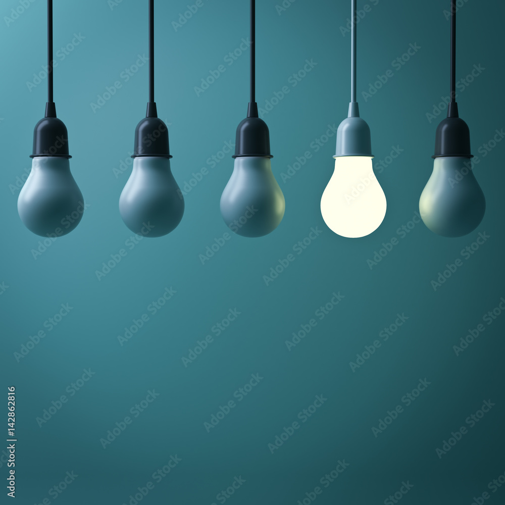 Poster one hanging light bulb glowing different standing out from unlit incandescent bulbs with reflection 