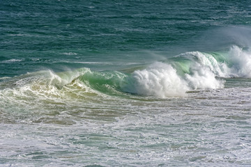 Wave crashing at Ipanema beach