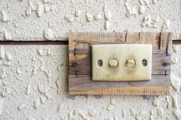 light switch of Switch on the old lights on the wall.