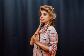 Young girl making hairdress