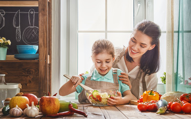 Happy family in the kitchen.