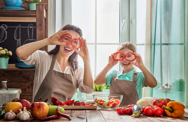 Happy family in the kitchen.