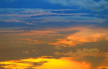 Fototapeta na wymiar sunset beautiful colorful light gold in blue sky