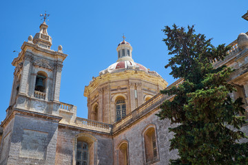 Obraz premium Dome and bell tower of the Collegiate Church of St Paul, Rabat, Malta