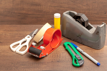 Broken and Dirty Stationary on wooden background.