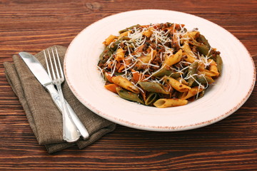 Pasta with meat, sauce and parmesan