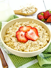 Oatmeal with strawberries on napkin