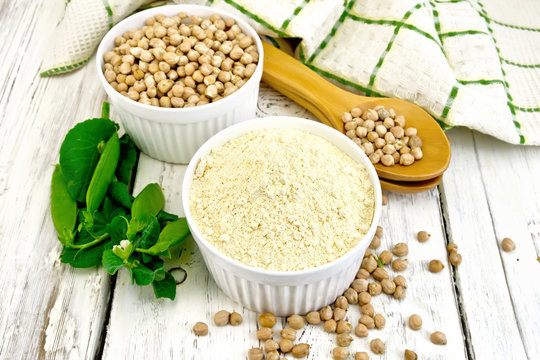 Flour chickpeas in bowl on light board