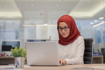 Portrait of young business woman in office