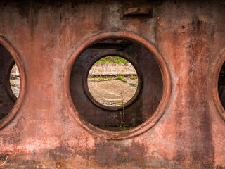 Old vintage rusty rail road turntable circle holes texture