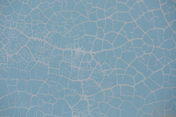 old cracked damaged plaster wall background