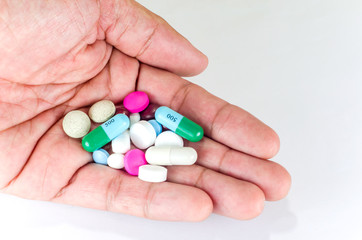 medicine in hand on white background. Isolated