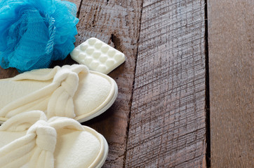 A spa or bath background with bath items on rustic wood with room for text