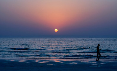 Dubai. Summer 2016. Sunset on the beach on the Persian Gulf.