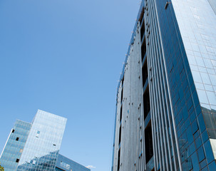 Fototapeta na wymiar modern glass silhouettes on modern building.