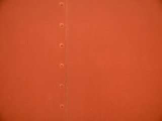 Vintage train carriage walls texture, red with pop rivets