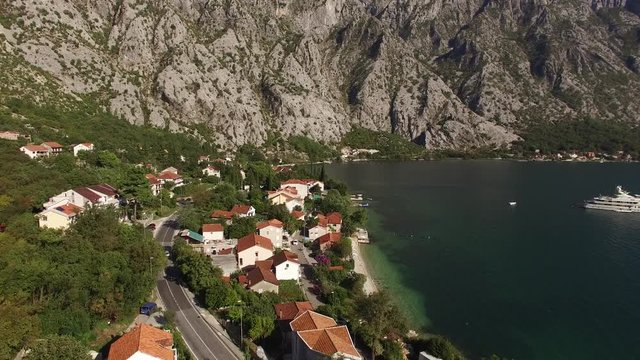 The villa in the mountains near the sea. Montenegro, Bay of Kotor. Shooting from the air, aerial photography drone.