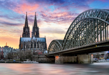 Cologne Cathedral and Hohenzollern Bridge at sunset - night