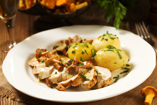 Roasted chicken breast served in a mushroom chanterelle sauce.