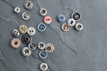 Vintage buttons on a black background