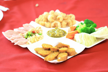 Sai Aua is name of northern Thai spicy sausage, in set of other foods at restaurant.